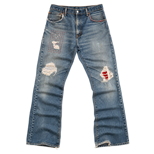 patched distressed bootcut denim